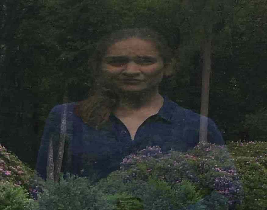 Marissa Frayer, English copywriter in Sweden, posing in a Dan Graham mirrored pavilion.